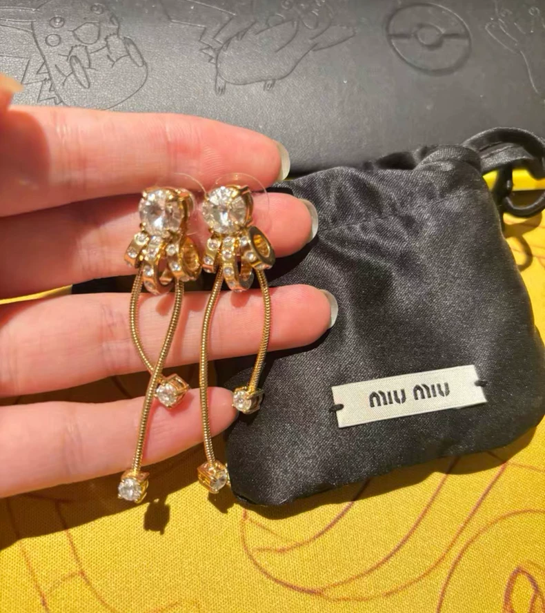 Miu Miu diamond tassel drop earrings